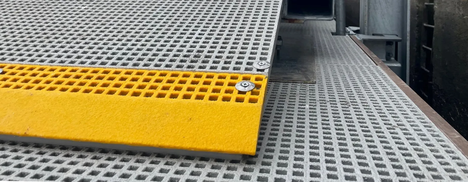 BM Ramp Edges

Designed to&nbsp;eliminate&nbsp;trip hazards at access points,&nbsp;our&nbsp;GRP Ramp Edges&nbsp;help improve pedestrian safety while&nbsp;maintaining&nbsp;a clean and professional finish to grating installations. The integral anti-slip surface ensures reliable traction even in wet or oily environments, making them suitable for demanding industrial,&nbsp;public&nbsp;and marine&nbsp;settings.

Manufactured in high-visibility RAL 1003 (yellow),&nbsp;BM Ramp&nbsp;Edges are available to suit 19 &times; 19mm and 38 &times; 38mm mesh sizes&nbsp;and&nbsp;22mm, 30mm and 38mm panel depths, ensuring compatibility with common grating specifications.&nbsp;Other&nbsp;types and&nbsp;colours are available on request.
