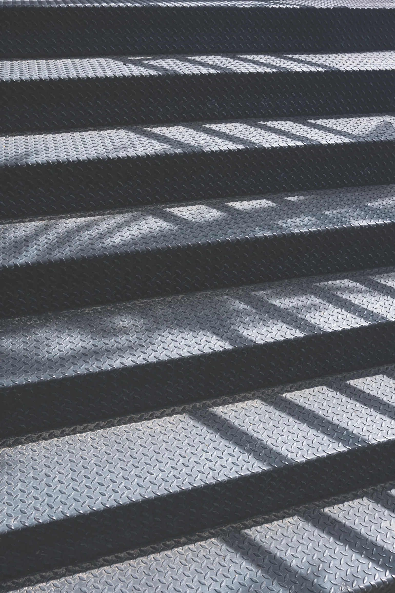 Durbar Steel Plate Stair Treads
Durbar stair treads are manufactured from steel tread plate featuring a raised pattern that provides a strong, slip-resistant walking surface. These treads are well suited to applications where a solid step is preferred while still delivering reliable underfoot grip.
Available in a self-colour finish and a range of plate thicknesses, Durbar treads are supplied in standard tread depths of 265mm with up and down turns to suit common stair configurations.
Standard tread lengths include:
1000mm
1250mm
1500mm
Bespoke sizes can also be manufactured to meet specific project requirements.