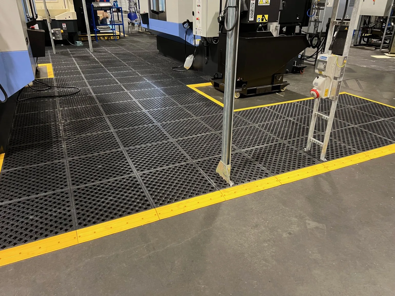 Typical Applications
Anti-fatigue safety flooring is widely used across a range of sectors, including:
Agriculture – ideal for dairy and equine environments, providing excellent drainage while improving comfort during long working hours
Manufacturing – used in production facilities worldwide for its ergonomic benefits and ability to withstand heavy loads and harsh conditions
Automotive – commonly specified for production lines, workstations and paint shops
Aeronautical and electronics – suitable for ESD-sensitive areas requiring safe, durable flooring
Retail and hospitality – busy kitchens, bar areas and service zones where staff stand for extended periods, helping reduce fatigue while providing slip resistance and durability
Marine – suitable for use on boats and in marine environments
Expert Advice and Specification Support
Our team help determine whether anti-fatigue flooring is suitable for your application and advise on tile type, layout and installation approach.
Contact us to discuss your requirements or explore our wider range of recycled plastic products that complement our GRP and steel access systems. Call us on 0114 254 3220.