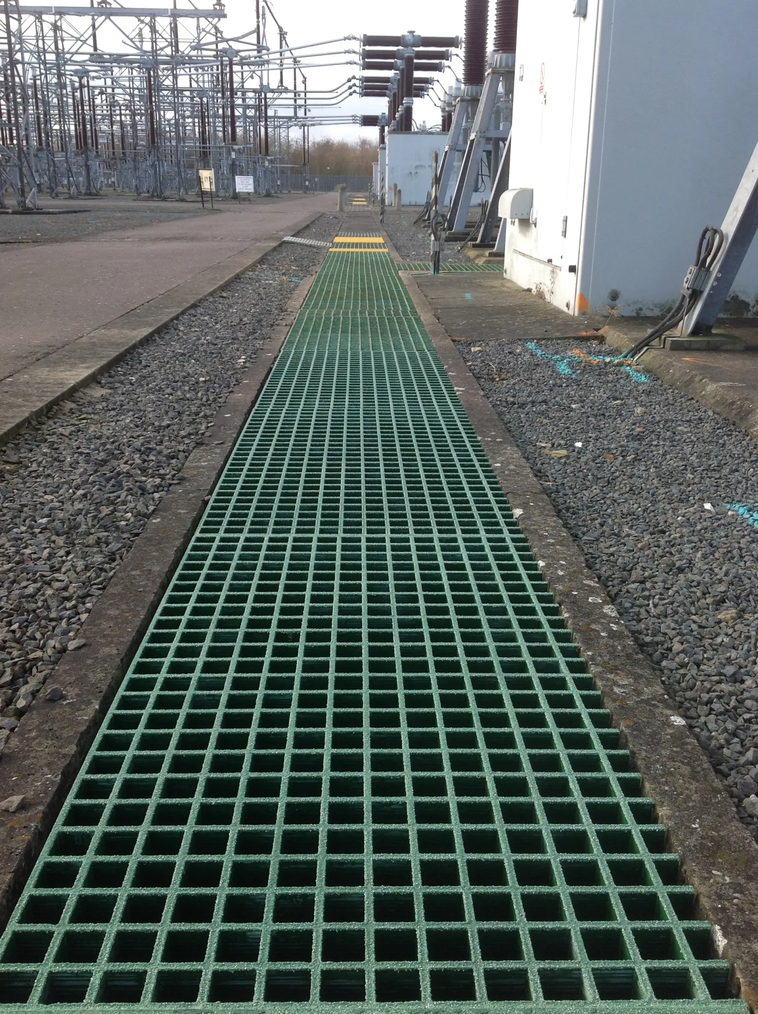 Our cable troughs and choice of covers provide a durable, lightweight and low maintenance solution for protecting and accessing service cables across a wide range of industrial and infrastructure environments.
Combining a 100% recycled plastic trough with anti-slip GRP grating lids, and tested to BS EN 124 Class A15 requirements, this system offers a practical alternative to traditional precast concrete units.
Designed for more efficient handling and faster installation, the system delivers excellent strength-to-weight performance while helping save time, labour requirements and ongoing maintenance costs.
Suitable for both new infrastructure projects and upgrade works, these modular troughs are ideal for environments where durability, safety and ease of access are essential.
The modular design allows straight runs to be formed efficiently by interlocking units end-to-end, supporting fast and practical on-site installation.