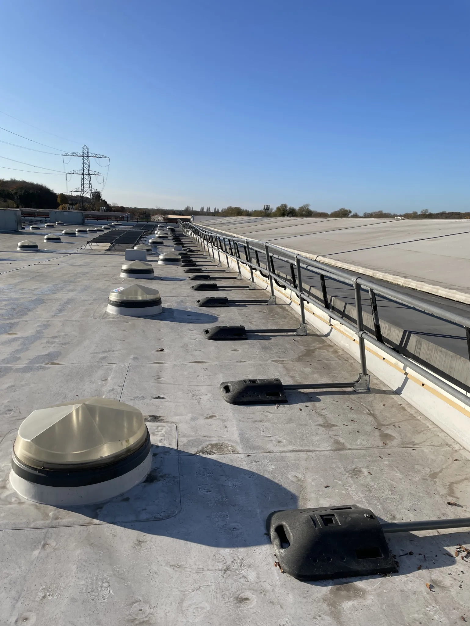 Roof Access & Edge Protection
Industrial buildings often require regular roof access for maintenance of HVAC systems, solar installations and other plant equipment. We supply roof access walkways, handrailed platforms and roof edge protection systems that allow maintenance teams to work safely at height while remaining compliant with current safety standards.