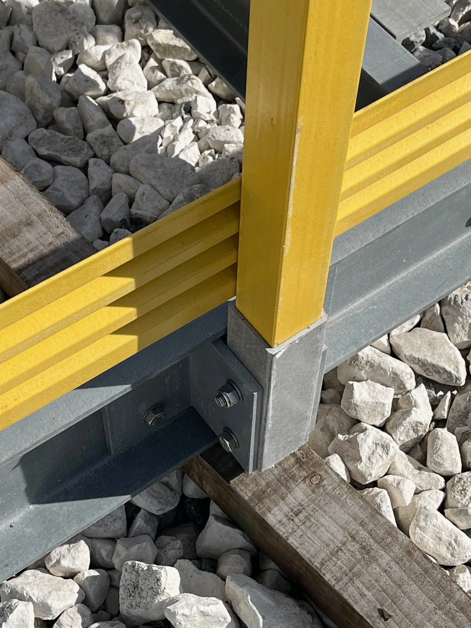 E23 Grade
Our pultruded profiles generally conform to the higher E23 grade.
Suitable for primary structural elements where stiffness, span capability, and serviceability limits are critical.
Greater than 5 mm wall thickness - typically E23
Minimum modulus: 23 GPa
Higher stiffness
Preferred for structural applications requiring reduced deflection and greater rigidity
E17 Grade
Suitable for general-purpose structures, moderate spans, and applications with relaxed deflection limits.
3-5 mm wall thickness - typically E17
Minimum modulus: 17 GPa
Lower stiffness
Suitable for general-purpose and lighter-duty applications.
Appropriate where deflection requirements are less critical